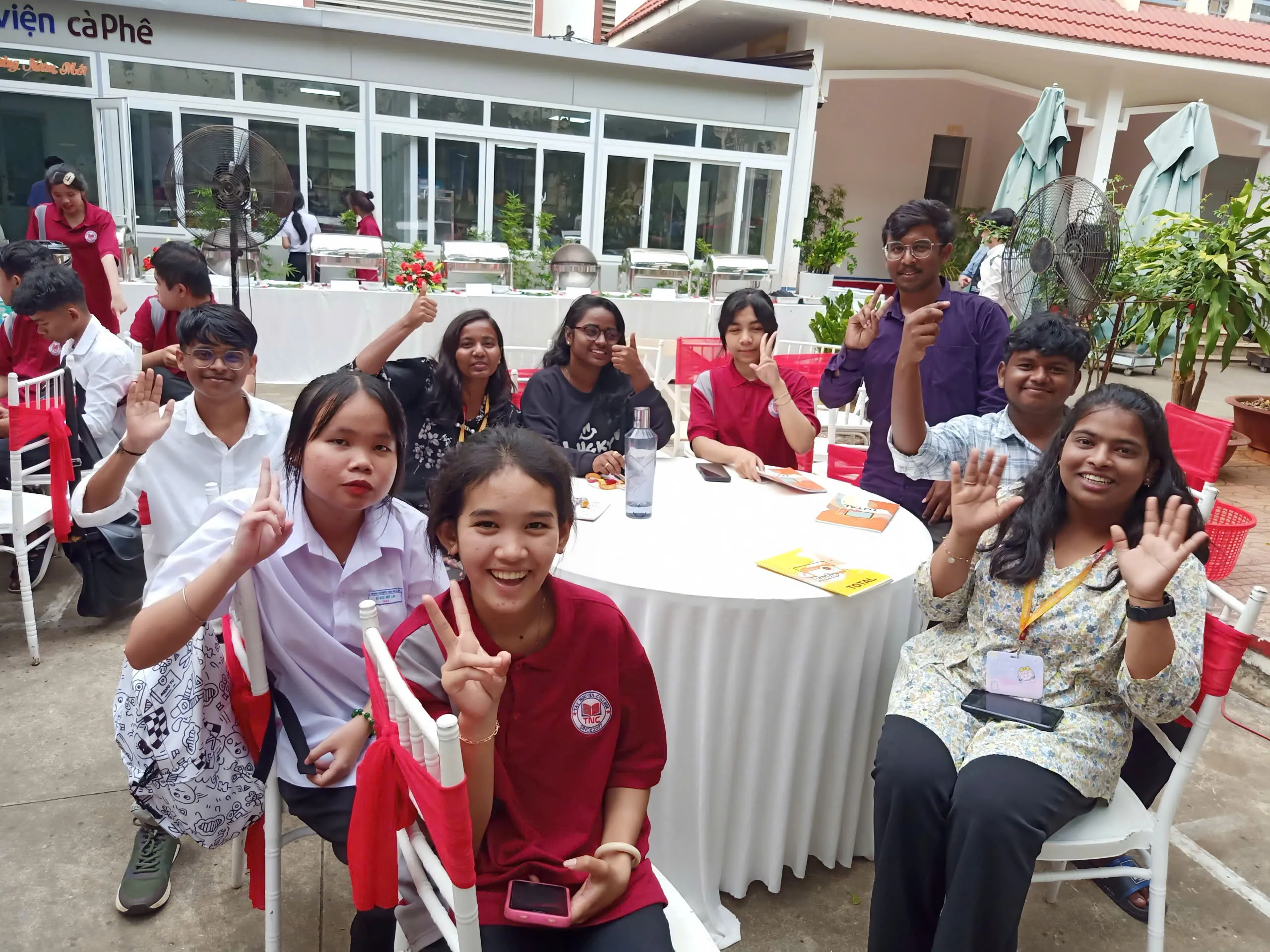 Students relaxing in campus garden area